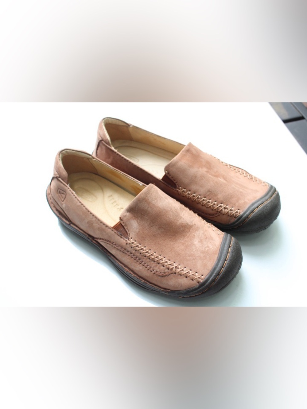 Keen brown stitch on slip-on loafer shoes